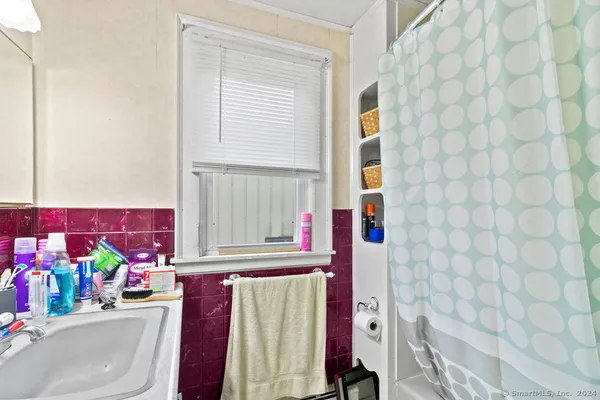 a picture of a park with furniture and a window