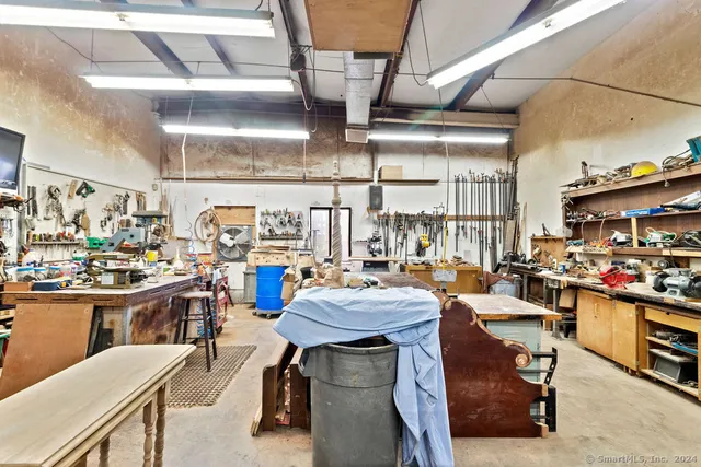 a view of a workspace with furniture