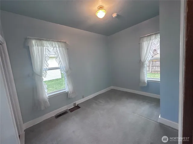 an empty room with a window