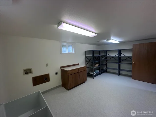 an empty room with furniture