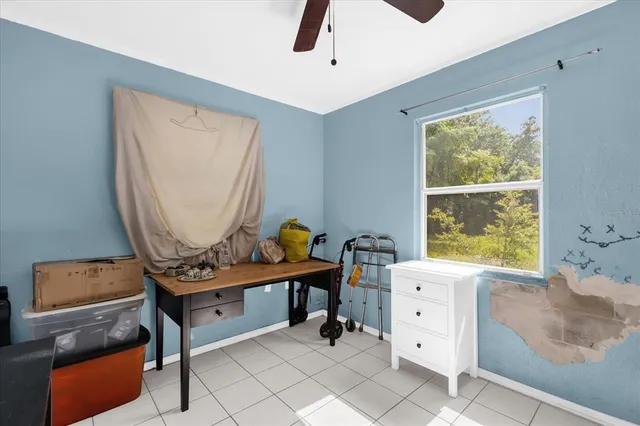 a room with furniture and a window