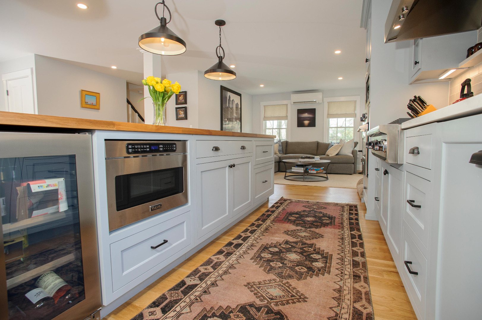 31 North Street Edgartown, MA 02539 - Photo 18 of 49 a kitchen with stainless steel appliances granite countertop a stove and a sink