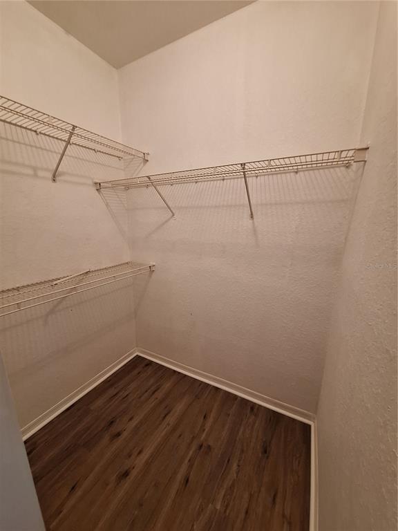 5140 Northridge Road, Unit 102 Sarasota, FL 34238 - Photo 15 of 32 a view of a room with racks on the wall
