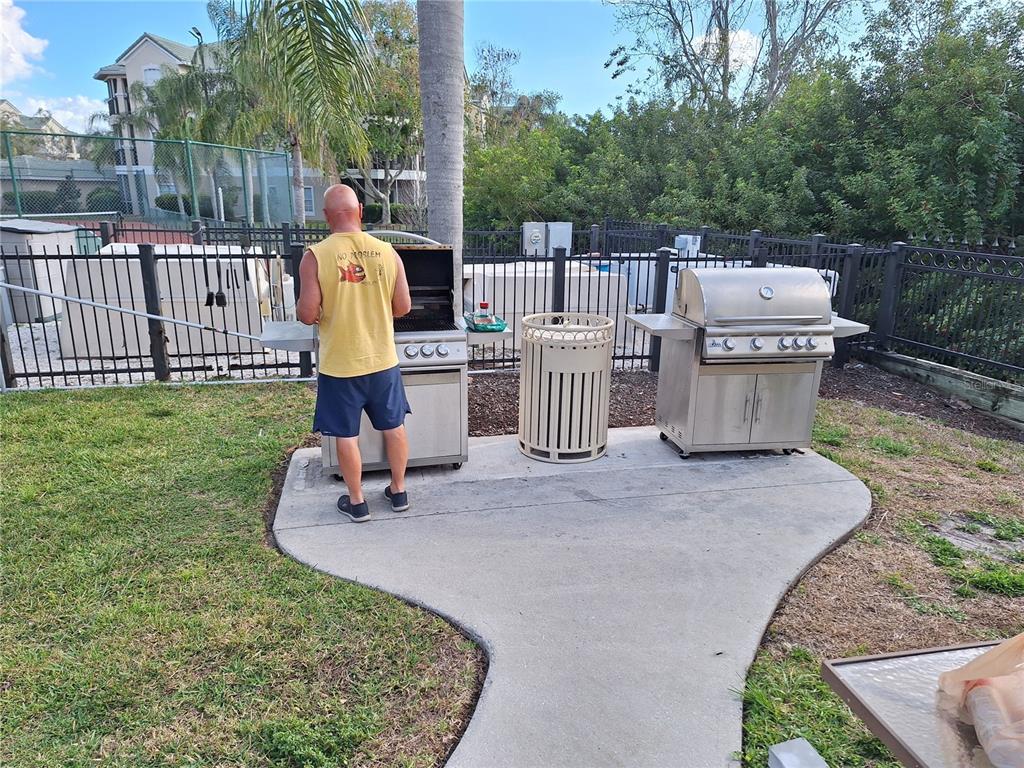 5140 Northridge Road, Unit 102 Sarasota, FL 34238 - Photo 27 of 32 a garden view with a sitting space