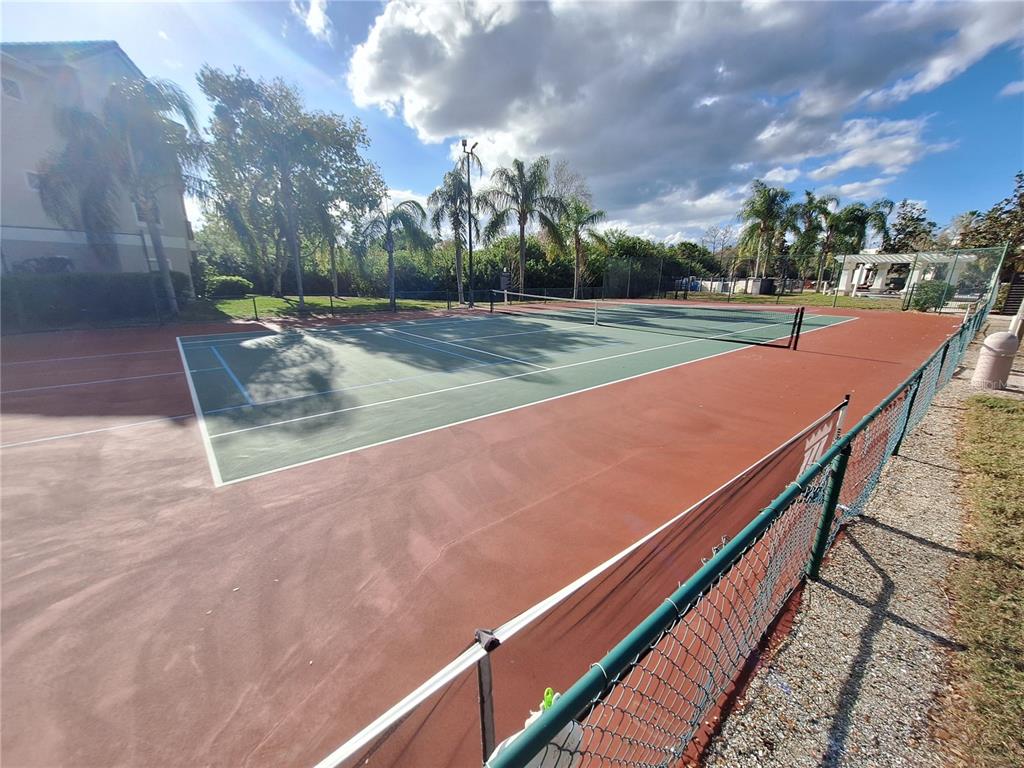 5140 Northridge Road, Unit 102 Sarasota, FL 34238 - Photo 29 of 32 a view of a tennis court