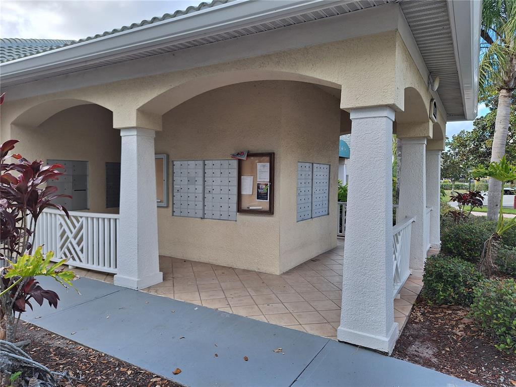 5140 Northridge Road, Unit 102 Sarasota, FL 34238 - Photo 30 of 32 front view of a house with a porch