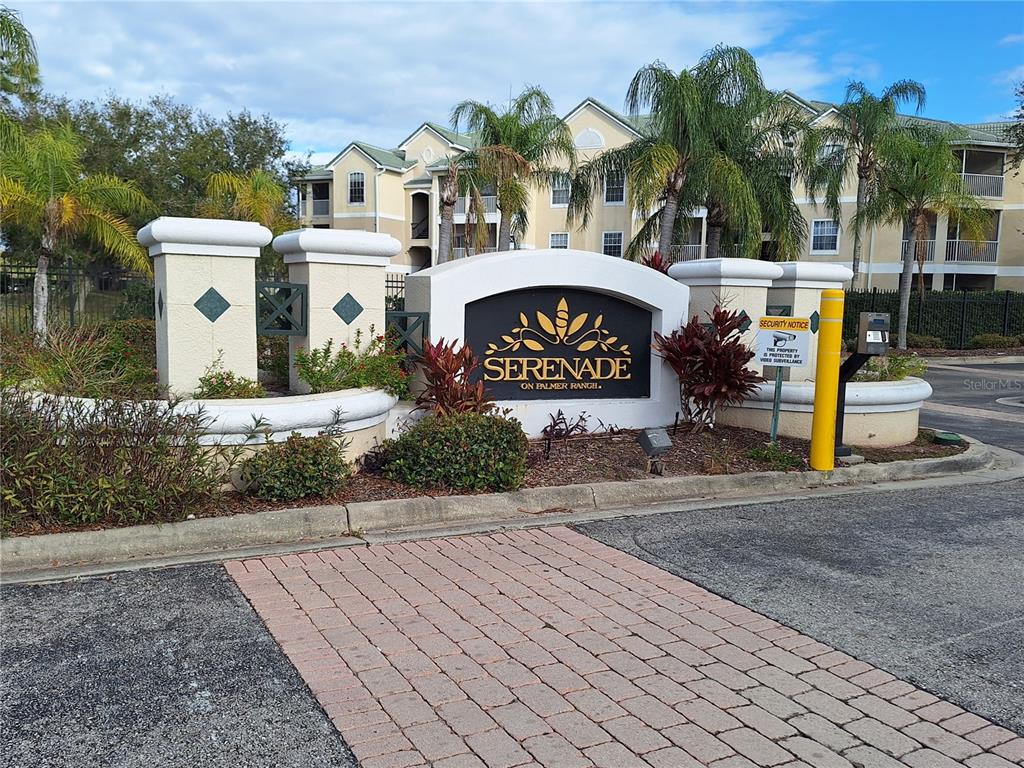 5140 Northridge Road, Unit 102 Sarasota, FL 34238 - Photo 31 of 32 a sign on the side of a building