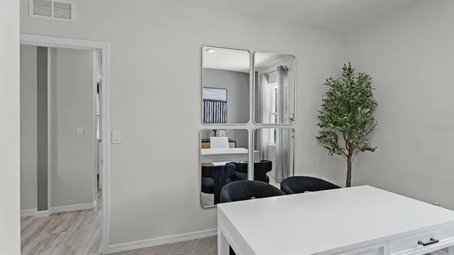 a bedroom with a bed and a closet