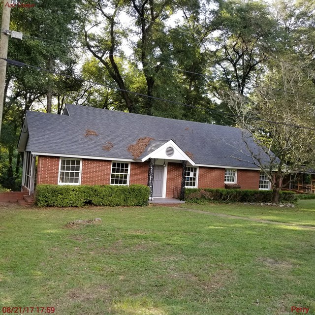 705 Charlse Drive Perry, GA 31069 - Photo 16 of 20 front view of a house with a yard
