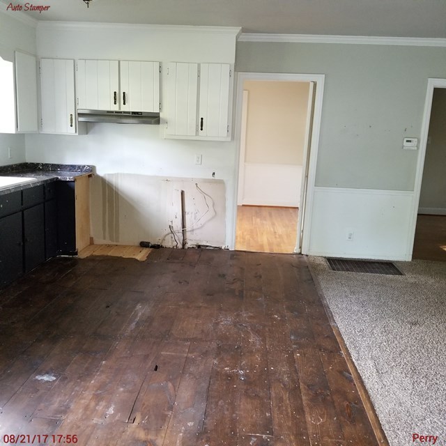 705 Charlse Drive Perry, GA 31069 - Photo 8 of 20 a kitchen with a sink and cabinets