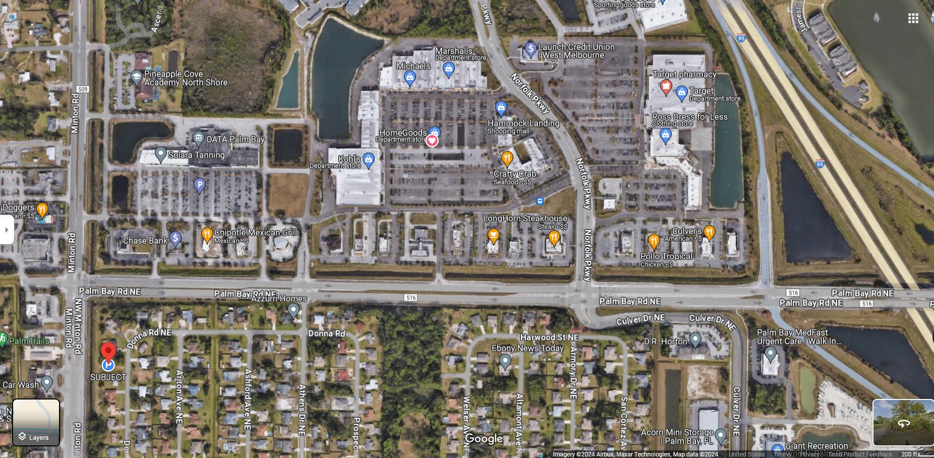 140 Donna Road Northeast Palm Bay, FL 32907 - Photo 4 of 6 a view of a tall building