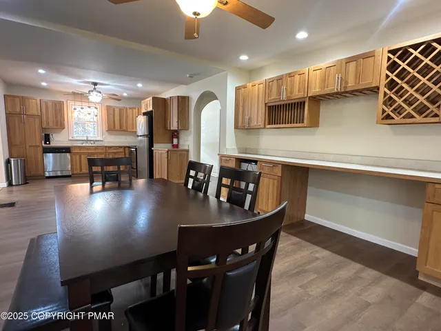 a kitchen with a sink a cabinets and window