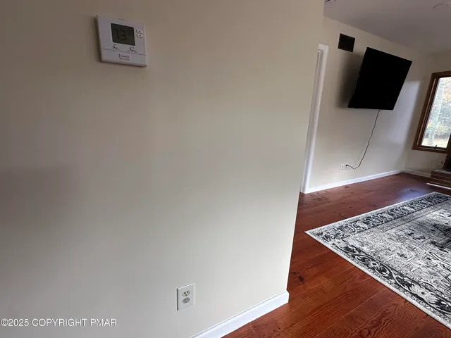 a bathroom with a sink a mirror and a shower