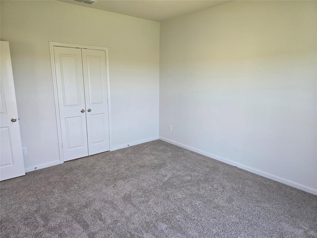 8425 Wibaux Road Ponder, TX 76259 - Photo 16 of 25 a view of an empty room and entryway
