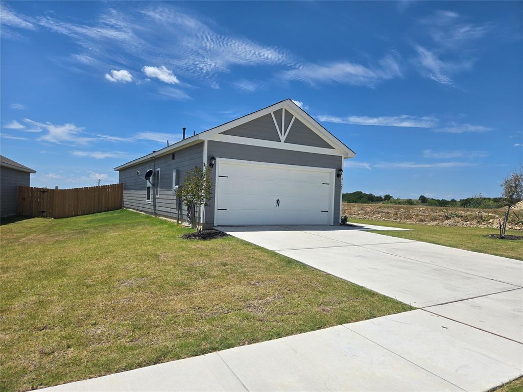8425 Wibaux Road Ponder, TX 76259 - Photo 3 of 25 a house view with a outdoor space