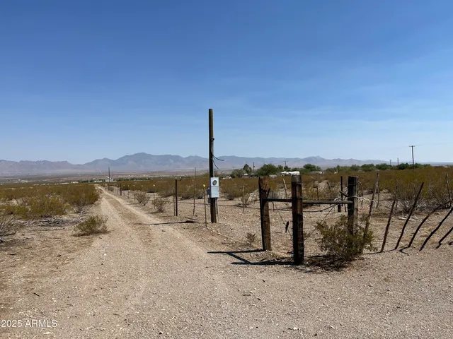 a view of an ocean and a mountain