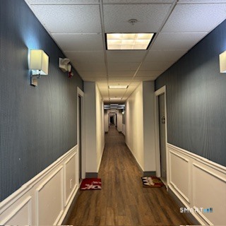 670 Boston Post Road, Unit 18 Milford, CT 06460 - Photo 15 of 18 a view of a hallway with a chandelier