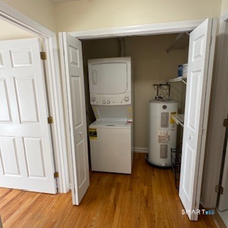 670 Boston Post Road, Unit 18 Milford, CT 06460 - Photo 7 of 18 a view of walk in closet with wooden floor and closet