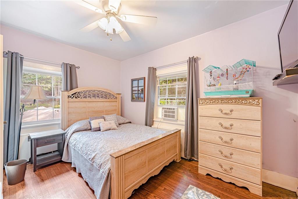 1100 State Rt 30 Laughlintown, PA 15655 - Photo 29 of 50 a bedroom with a bed and a dresser