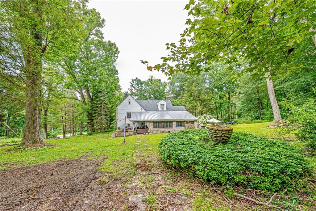 1100 State Rt 30 Laughlintown, PA 15655 - Photo 46 of 50 a house view with a garden space