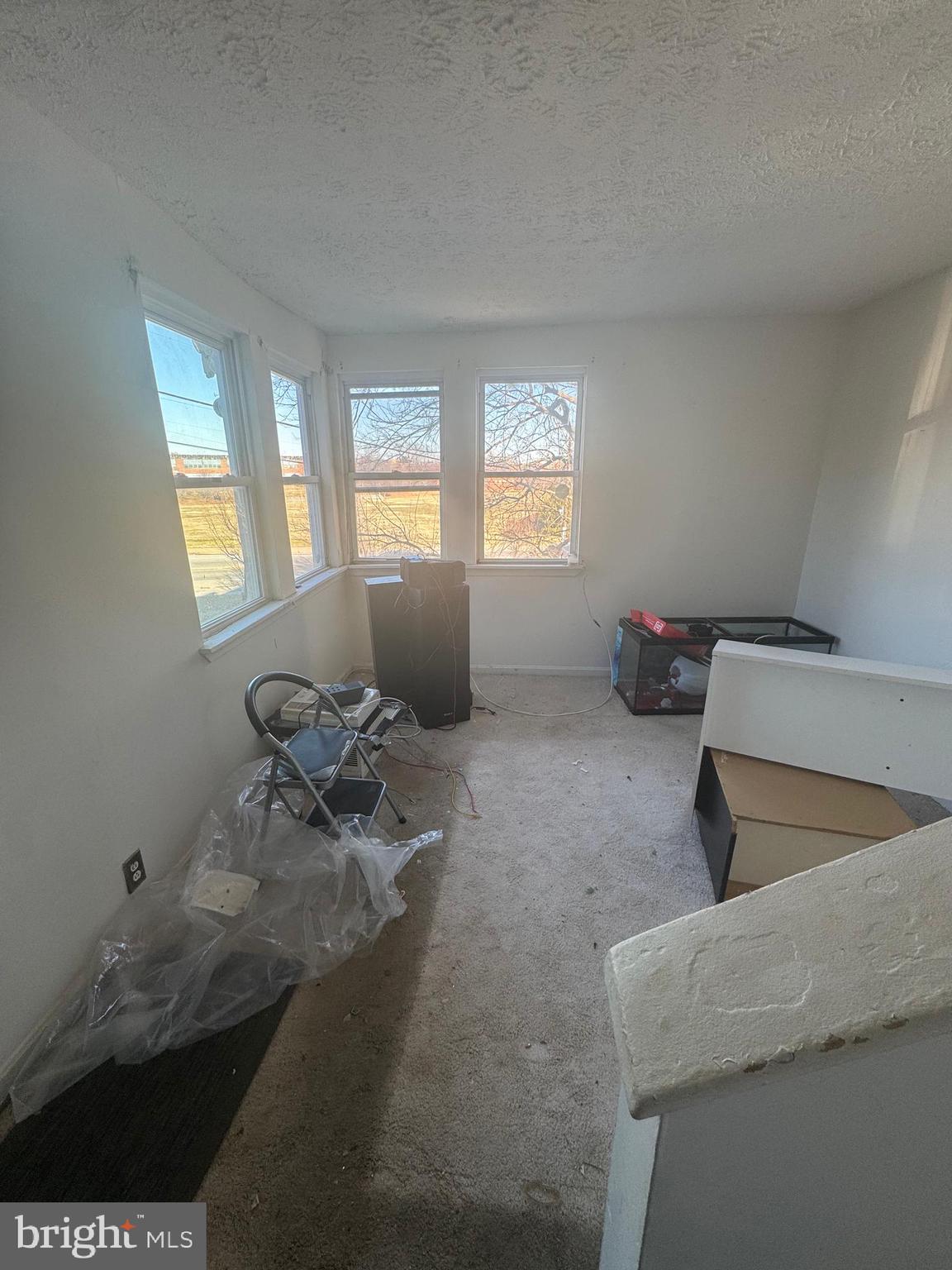 515 Cherry Hill Road Baltimore, MD 21225 - Photo 14 of 62 a living room with furniture and a window