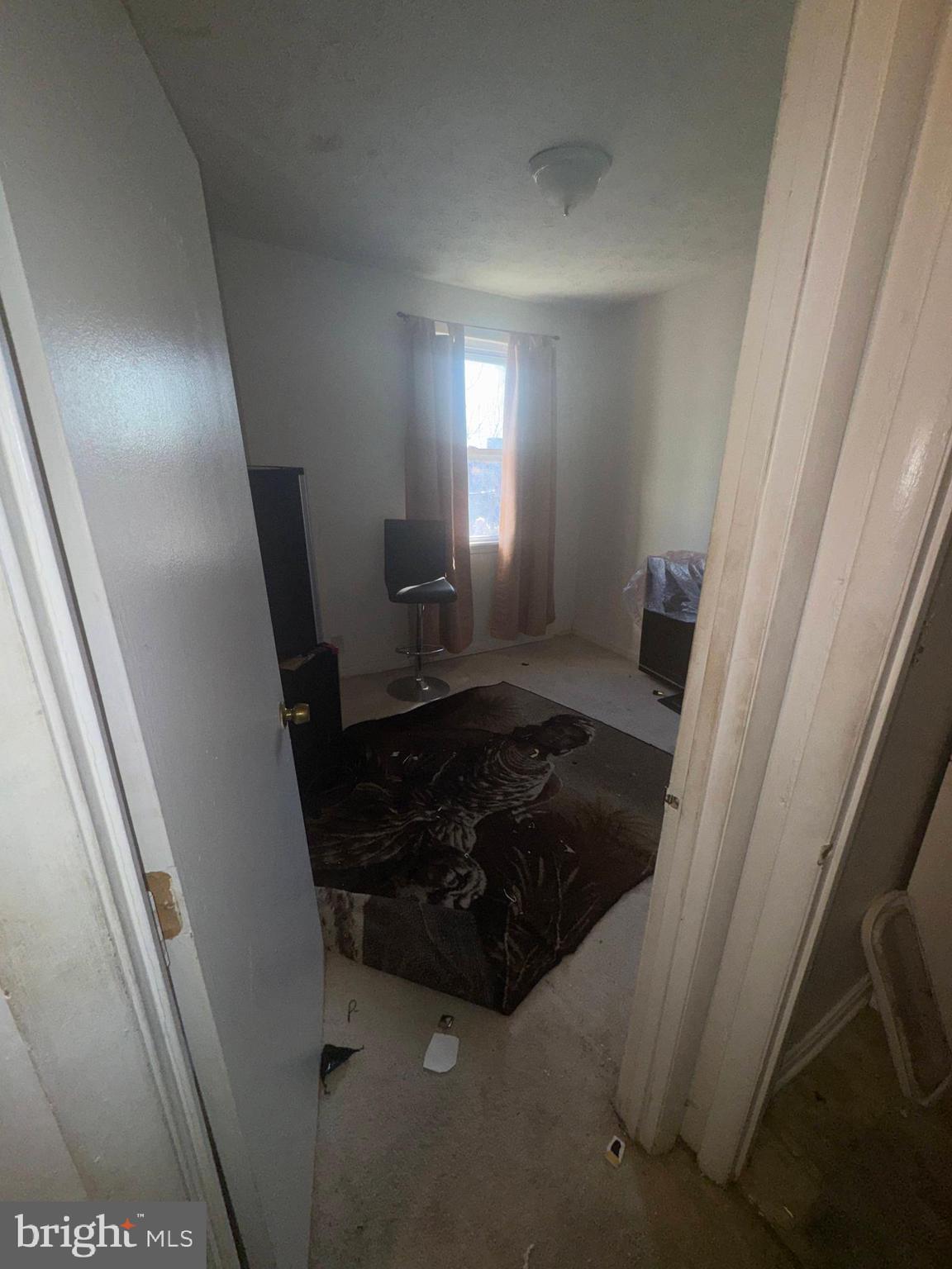 515 Cherry Hill Road Baltimore, MD 21225 - Photo 37 of 62 a bathroom with a sink and a mirror