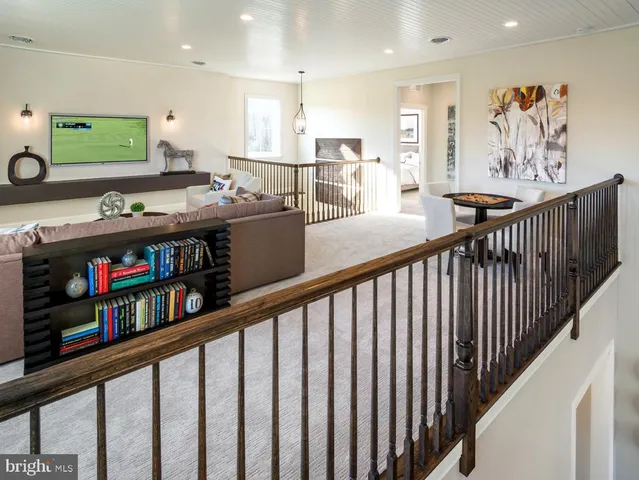 a open kitchen with stainless steel appliances kitchen island granite countertop a sink and cabinets