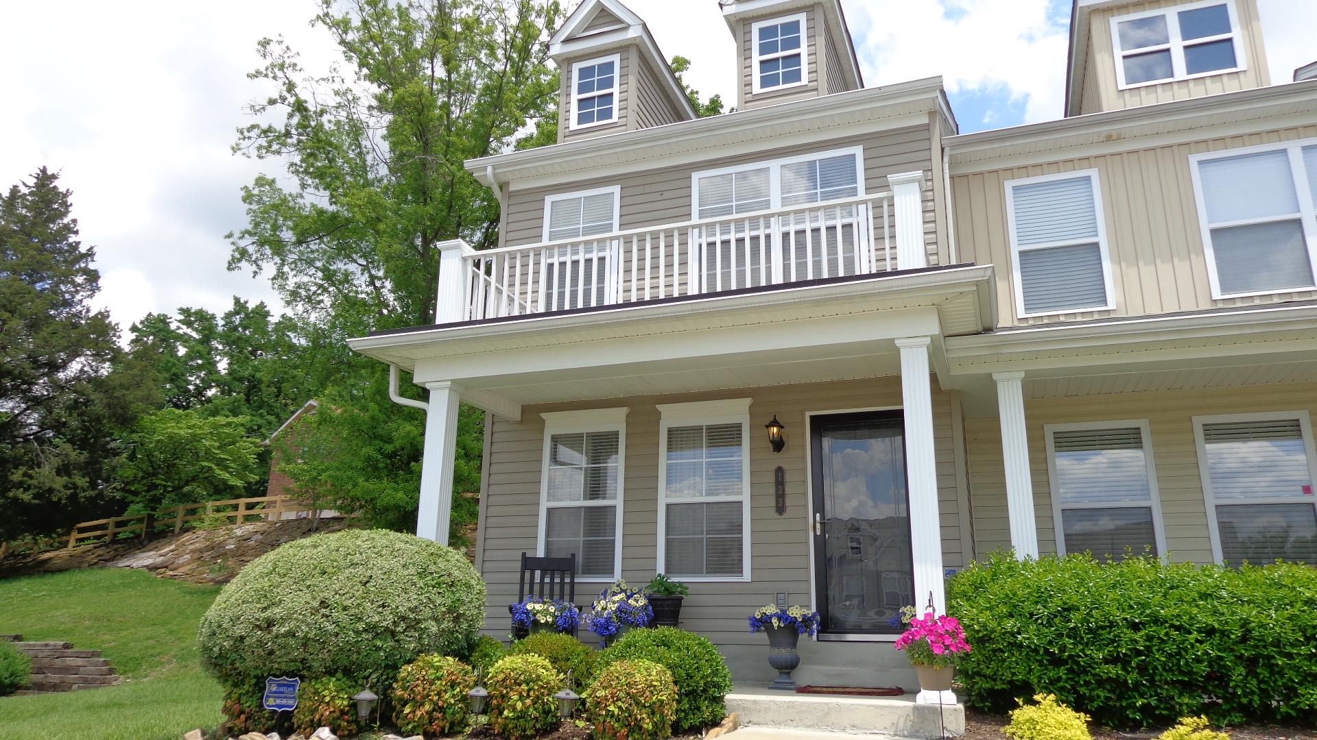 1382 Rural Hill Road, Unit 133 Antioch, TN 37013 - Photo 1 of 18 front view of a brick house with a yard