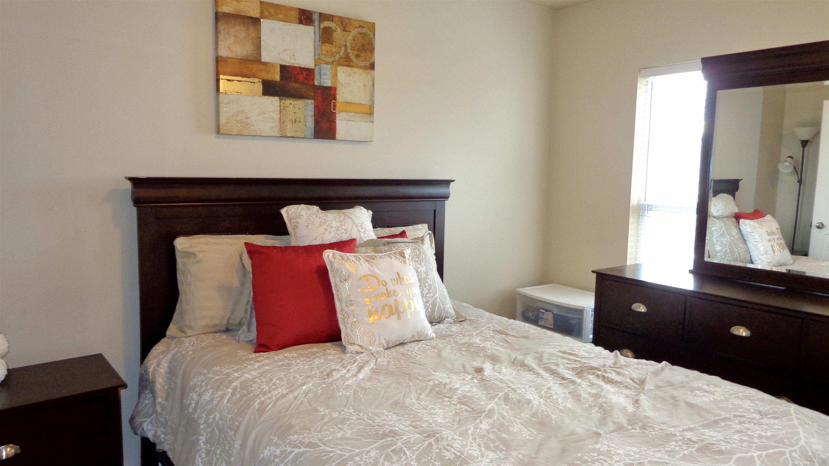 1382 Rural Hill Road, Unit 133 Antioch, TN 37013 - Photo 13 of 18 a bedroom with a bed and a window