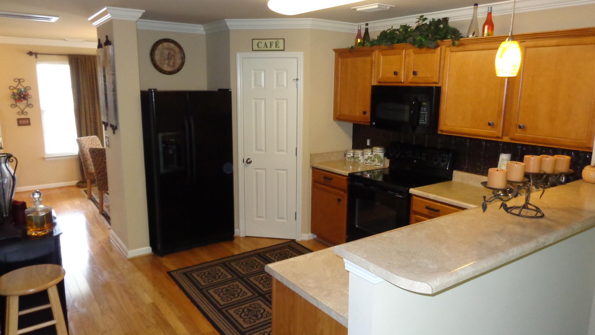 1382 Rural Hill Road, Unit 133 Antioch, TN 37013 - Photo 6 of 18 a kitchen with a sink and a refrigerator