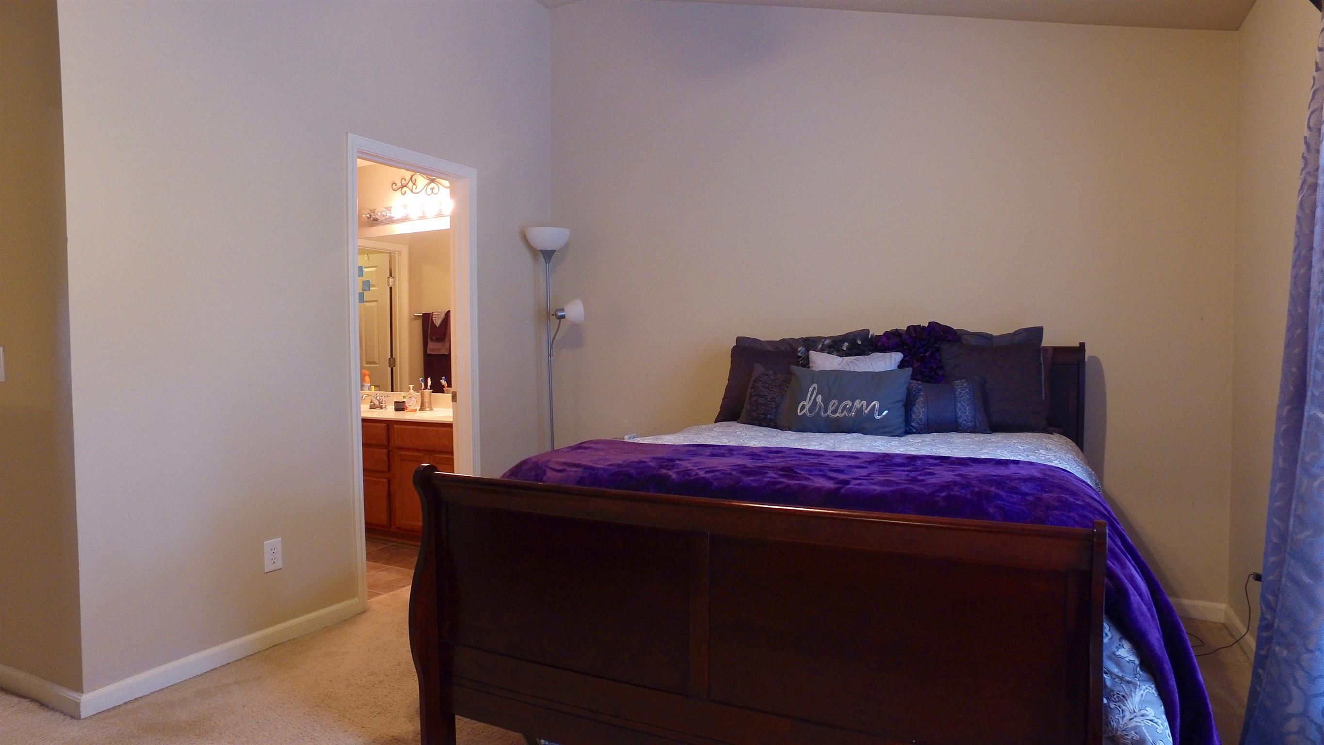 1382 Rural Hill Road, Unit 133 Antioch, TN 37013 - Photo 9 of 18 a bedroom with a bed and a closet