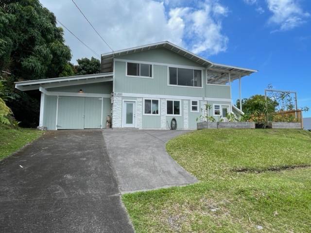 81-1010 St John's Road Kealakekua, HI 96750 - Photo 1 of 30 a front view of a house with a yard