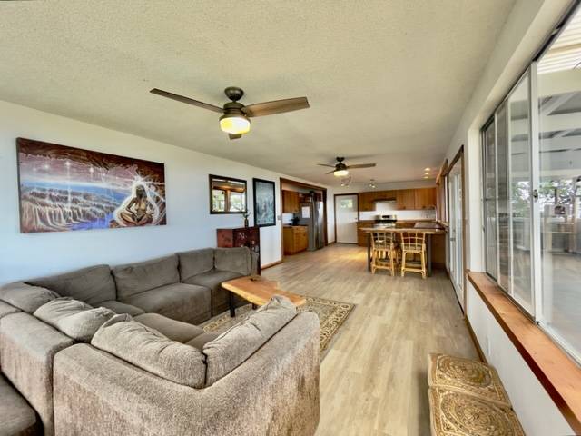 81-1010 St John's Road Kealakekua, HI 96750 - Photo 12 of 30 a living room with furniture and a rug