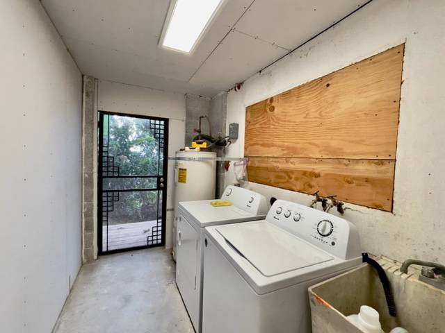 81-1010 St John's Road Kealakekua, HI 96750 - Photo 24 of 30 a utility room with dryer and washer