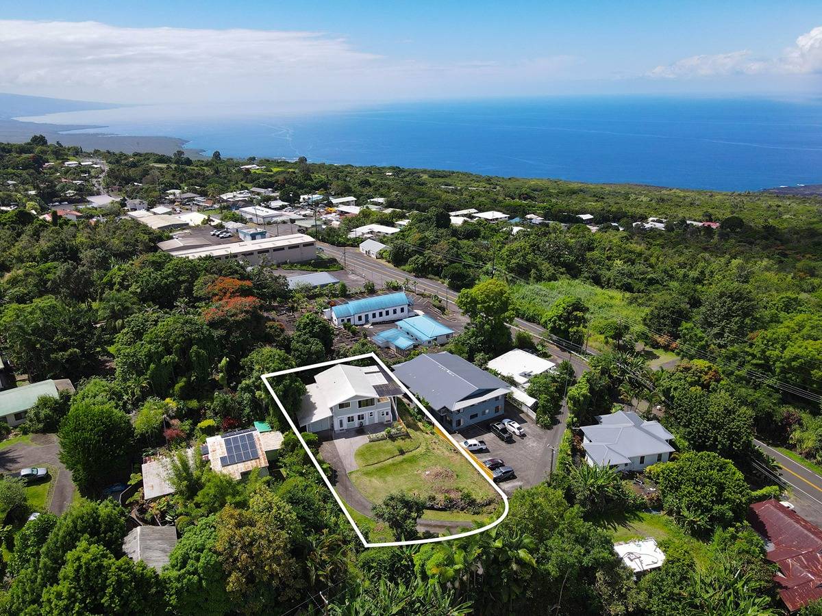 81-1010 St John's Road Kealakekua, HI 96750 - Photo 29 of 30 an aerial view of residential houses with outdoor space and trees