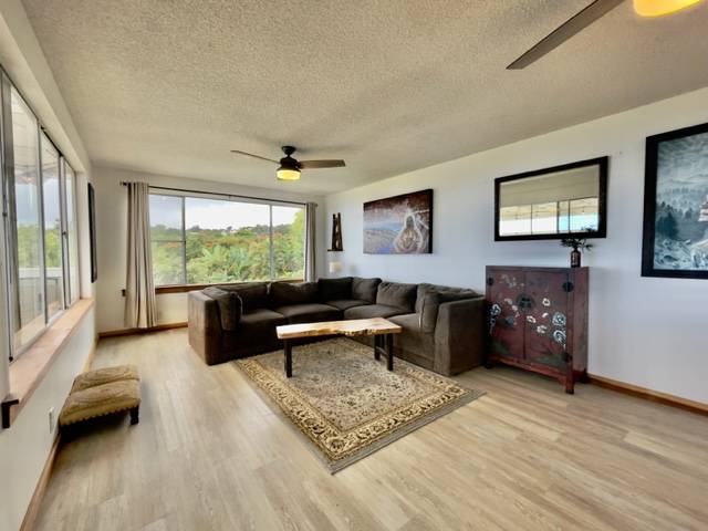 81-1010 St John's Road Kealakekua, HI 96750 - Photo 10 of 30 a living room with furniture and a window