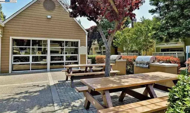 an outdoor space with furniture