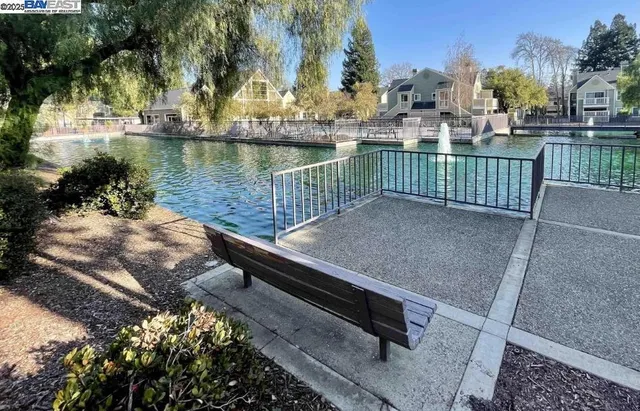 a view of a lake with a deck