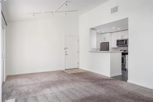 a view of a kitchen with a sink