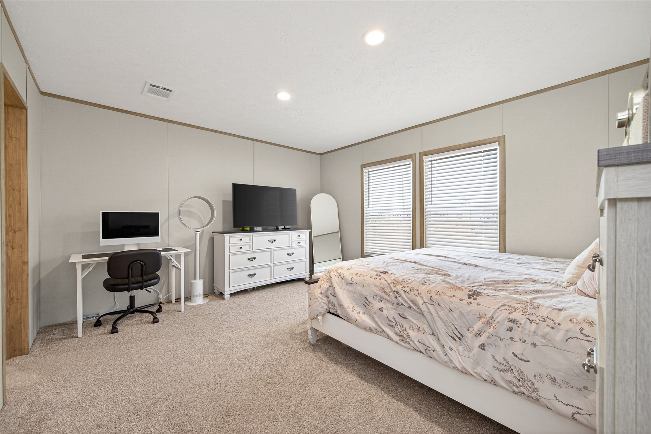 1218 Longleaf Pne Street Huffman, TX 77336 - Photo 12 of 29 Spacious primary bedroom offering a comfortable layout with ample natural light