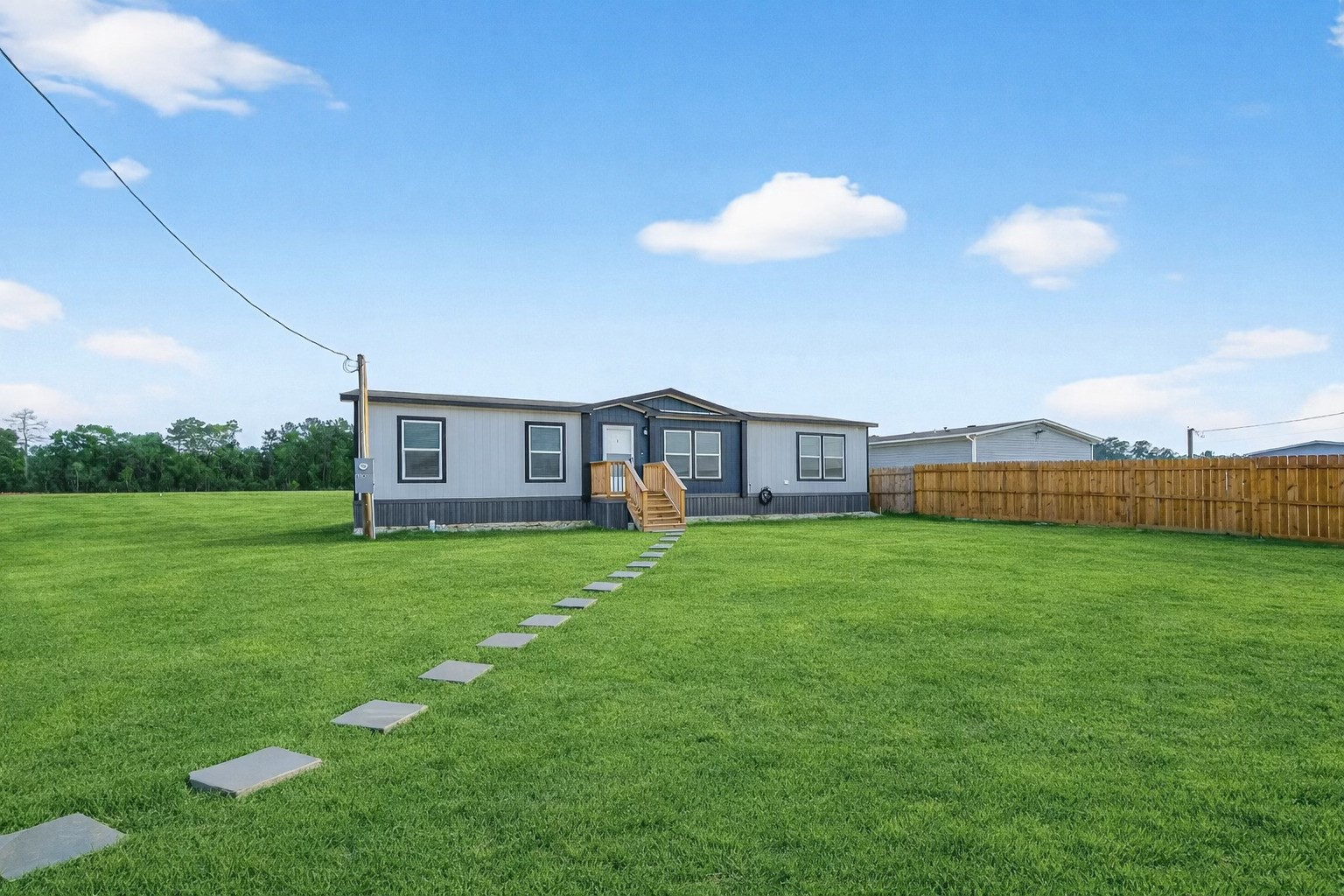 1218 Longleaf Pne Street Huffman, TX 77336 - Photo 28 of 29 Wide lot with ample space for outdoor use, no HOA and low taxes. Grass in images has been AI generated for visualization purposes.