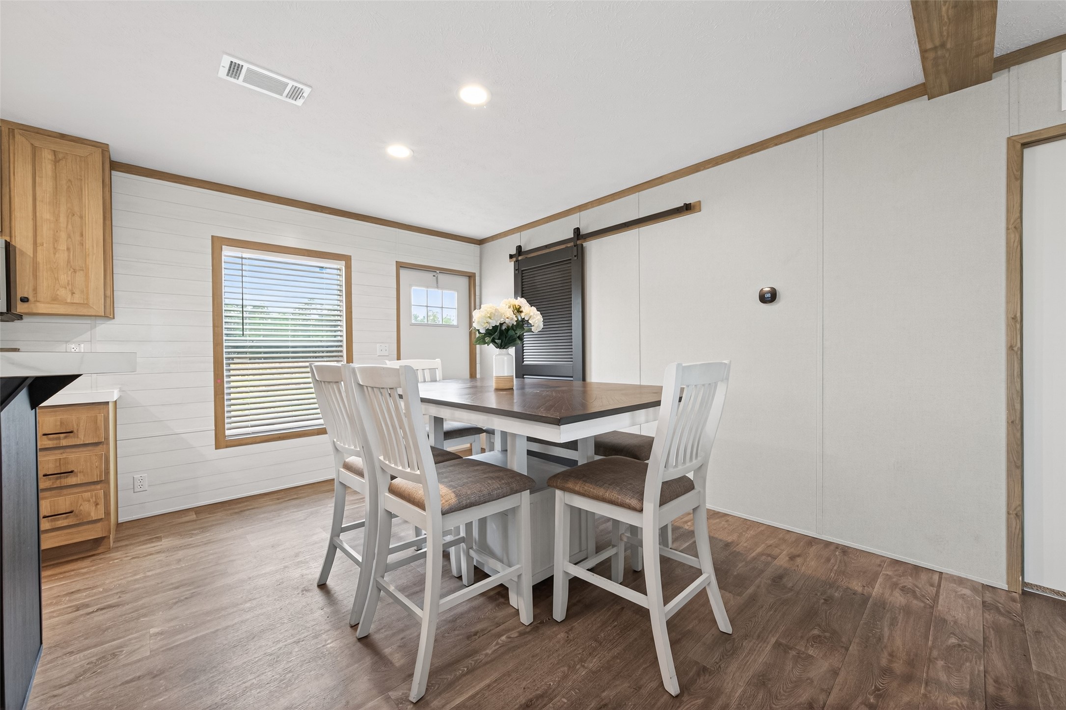 1218 Longleaf Pne Street Huffman, TX 77336 - Photo 10 of 29 Open dining area conveniently located between the kitchen and living room, ideal for gatherings and daily meals