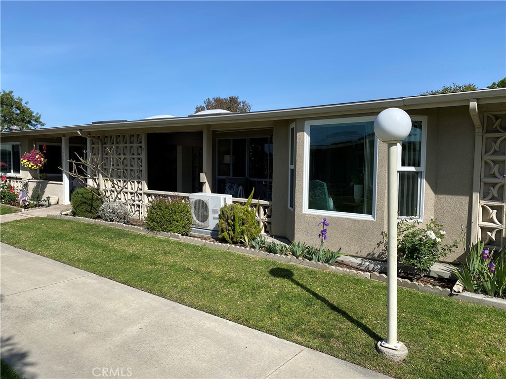 1640 Glenview Road Seal Beach, CA 90740 - Photo 1 of 1 a front view of a house with a yard