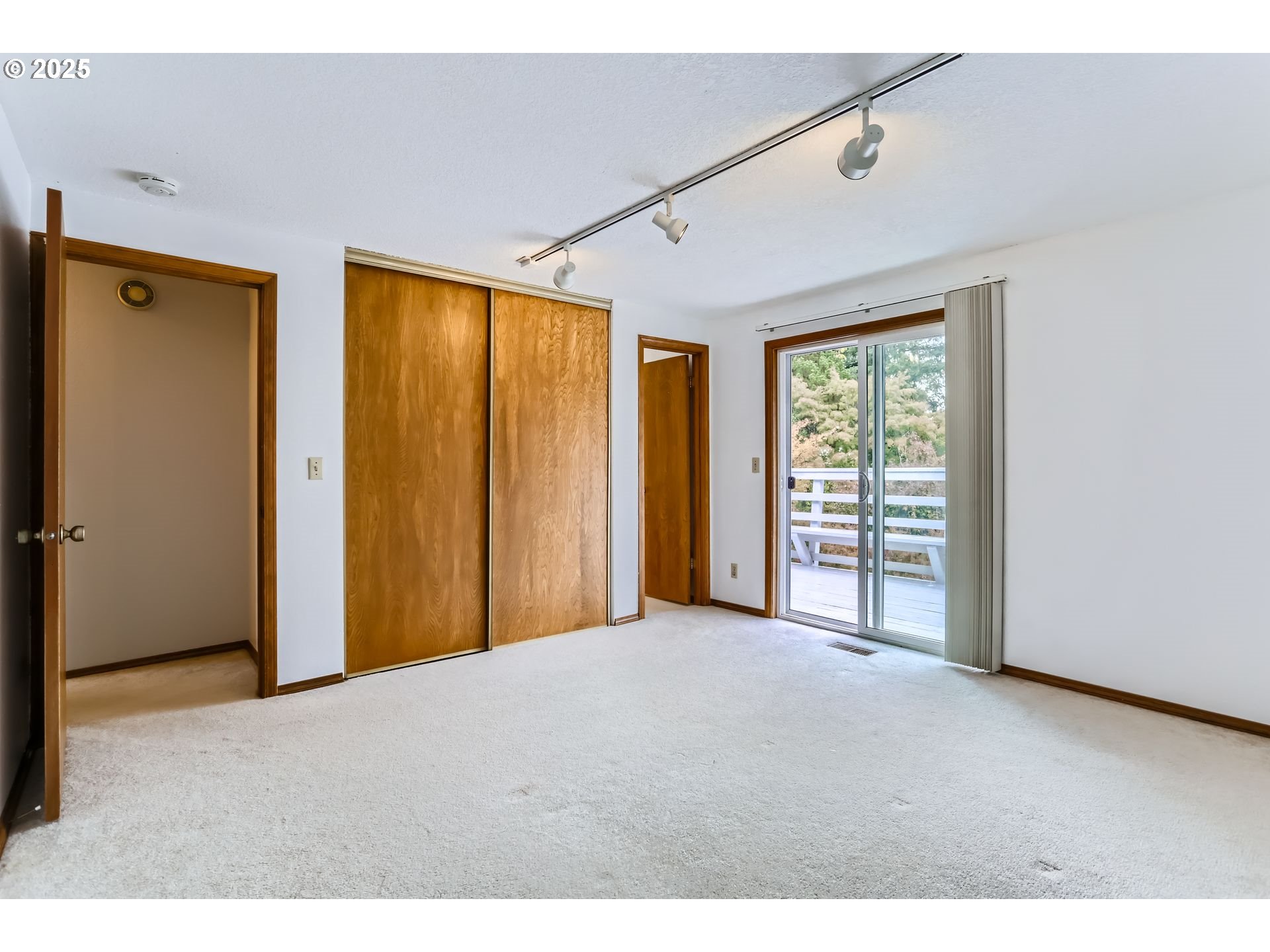 6518 Southwest 35th Avenue Portland, OR 97221 - Photo 13 of 36 a view of an empty room with a window