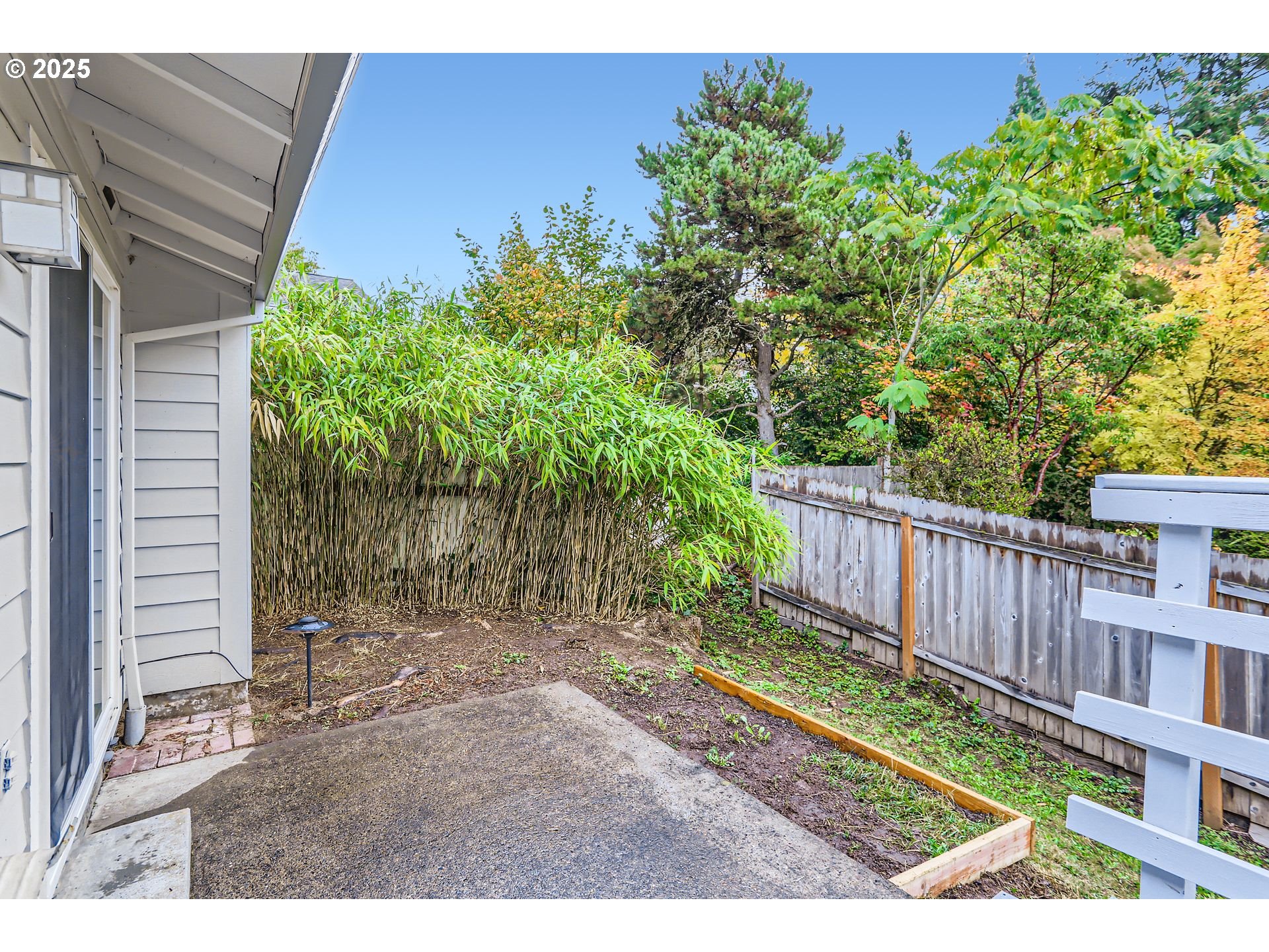6518 Southwest 35th Avenue Portland, OR 97221 - Photo 28 of 36 a backyard of a house with lots of green space