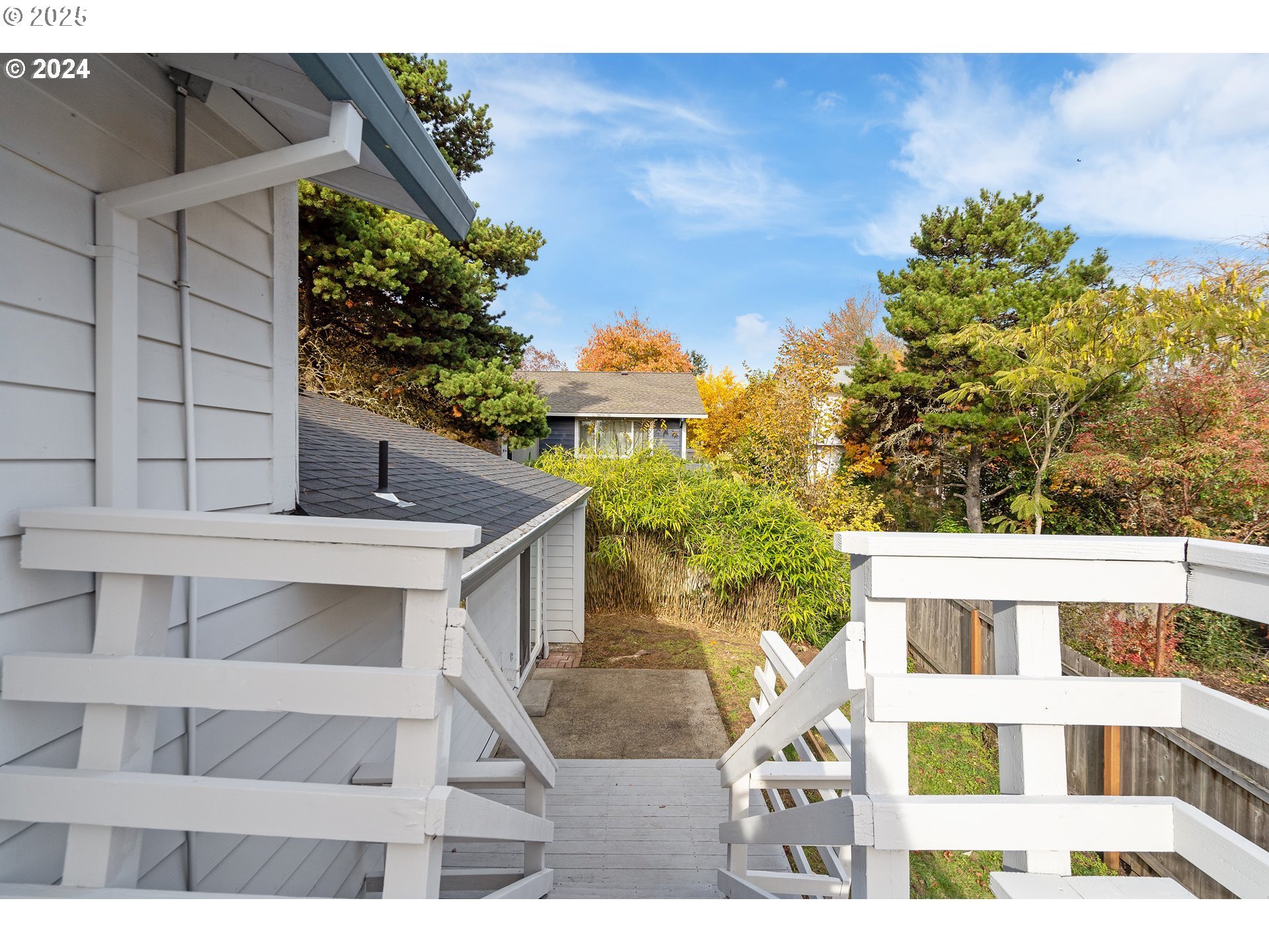6518 Southwest 35th Avenue Portland, OR 97221 - Photo 35 of 36 a view of a tall building in the backyard