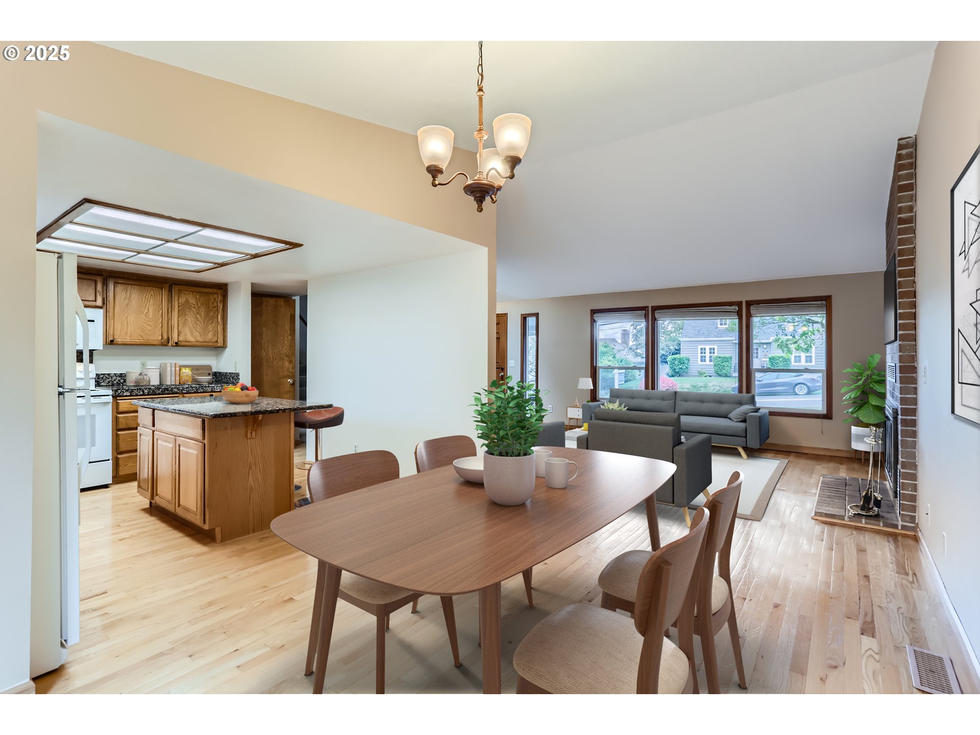6518 Southwest 35th Avenue Portland, OR 97221 - Photo 7 of 36 a view of a dining room with furniture and wooden floor