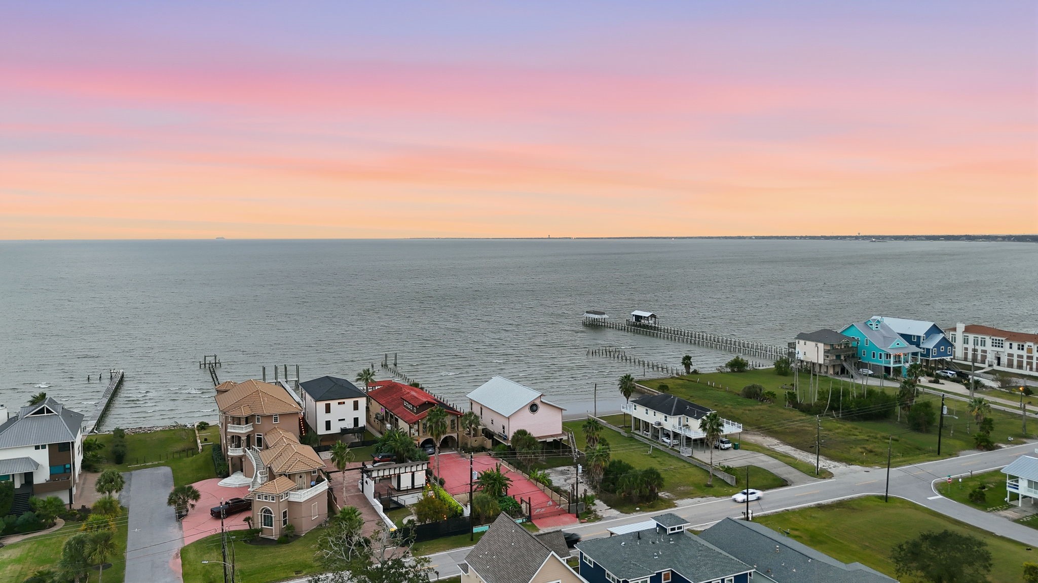 1918 Todville Road Seabrook, TX 77586 - Photo 38 of 41 Imagine waking up to pelicans gliding by, dolphins and other wildlife in the bay, and boats cruising past your private shoreline as you sip coffee on the balcony.