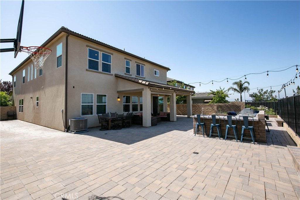 19680 Griffith Drive Saugus, CA 91350 - Photo 22 of 49 a view of a house with patio