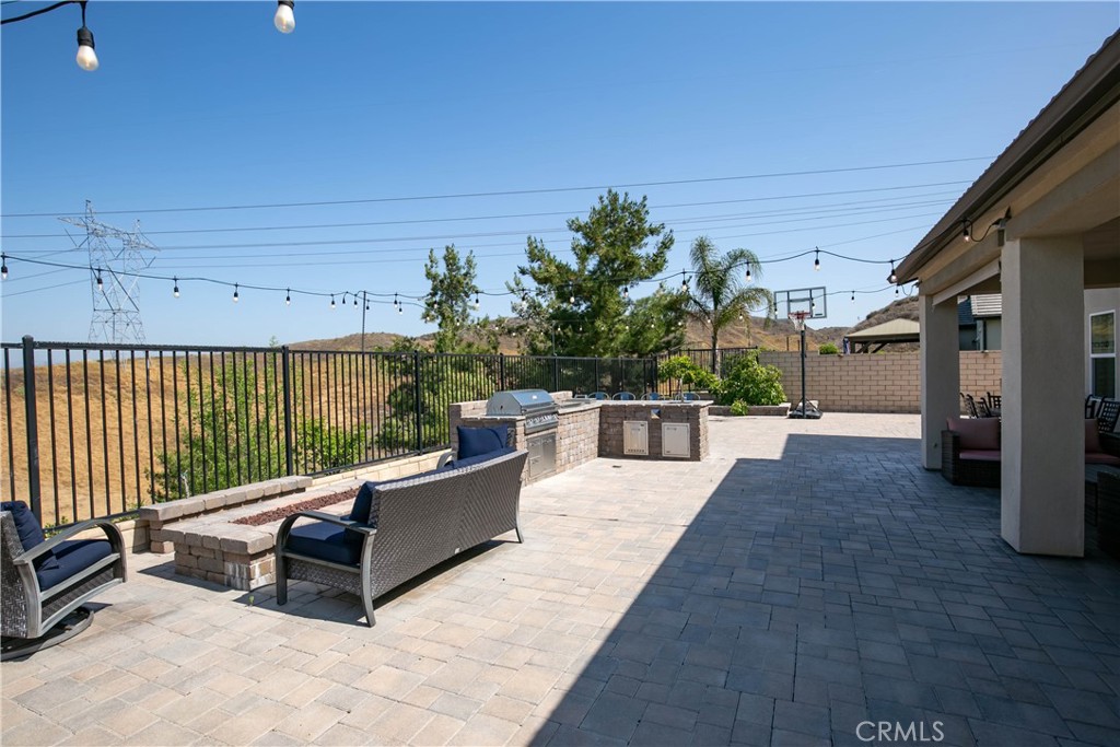 19680 Griffith Drive Saugus, CA 91350 - Photo 24 of 49 a view of a chairs and tables in the patio
